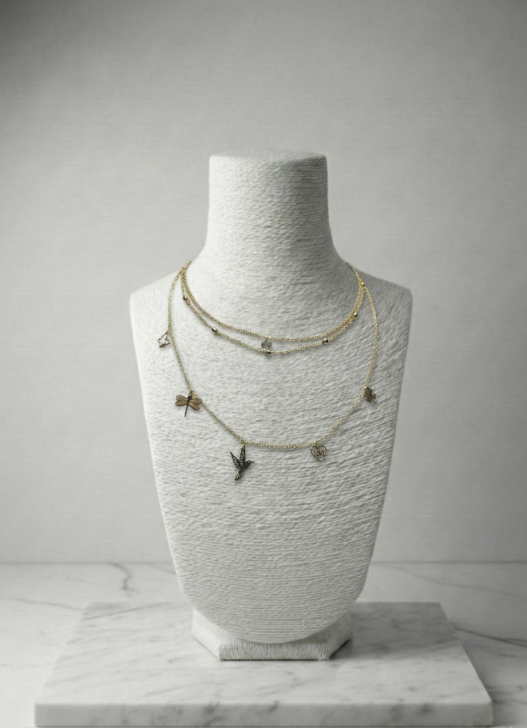 Hayatın Simgeleri: 3 Sıralı Çelik Charm'lı (Yusufçuk, Kuş, Yonca) Katmanlı Kolye