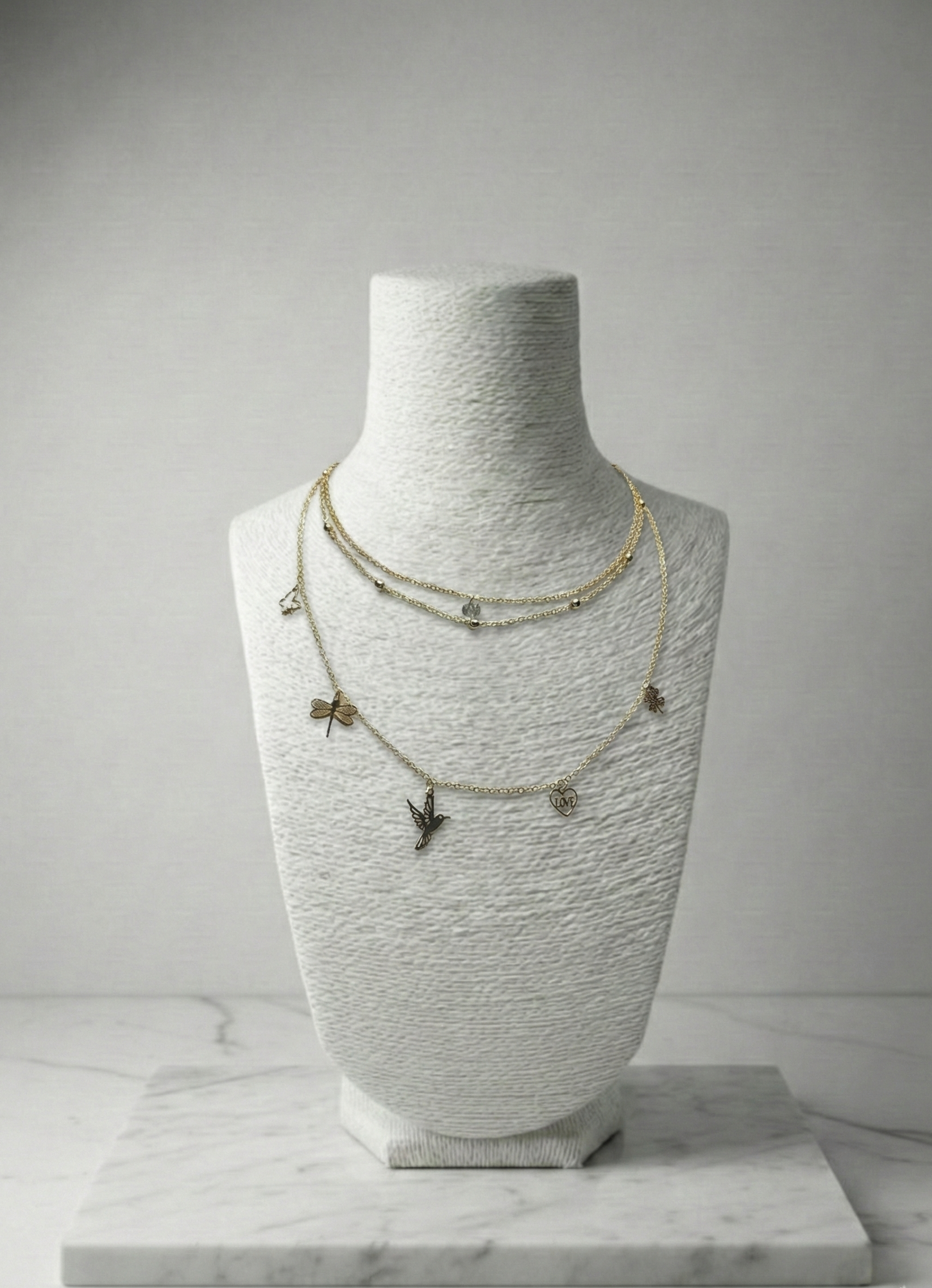 Hayatın Simgeleri: 3 Sıralı Çelik Charm'lı (Yusufçuk, Kuş, Yonca) Katmanlı Kolye