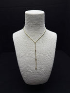 Işıltılı Dokunuş: Pul Detaylı ve Halka Charm'lı Çelik Y Kolye