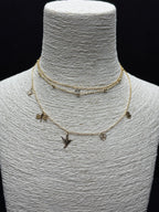 Hayatın Simgeleri: 3 Sıralı Çelik Charm'lı (Yusufçuk, Kuş, Yonca) Katmanlı Kolye